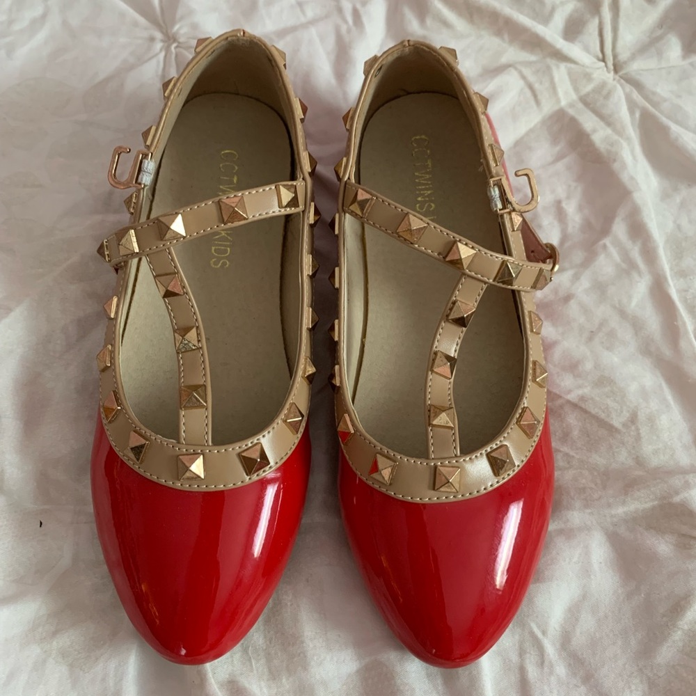 Girls red rockstud shoes